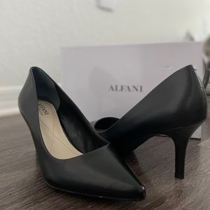 Black short pumps